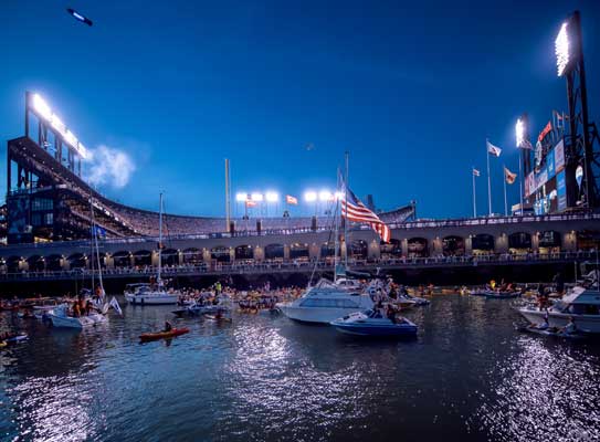 Oracle Park at night from the water